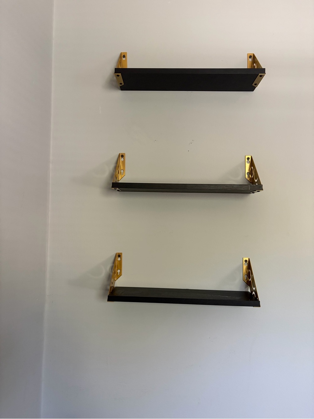 Black Floating Wall Shelves with Gold Brackets - Home Wall Decor
